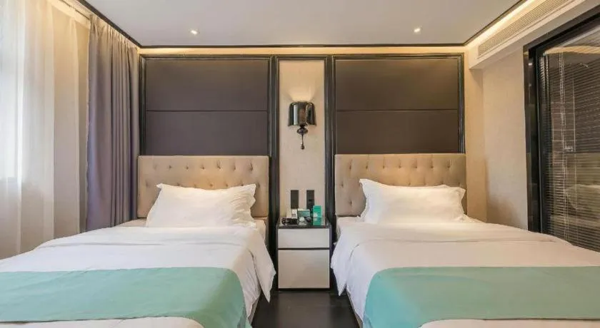 Bed in Xana Hotelle·Nanchang Bayi Square Metro Station