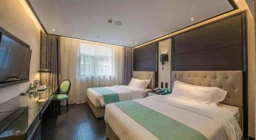 Bed in Xana Hotelle·Nanchang Bayi Square Metro Station