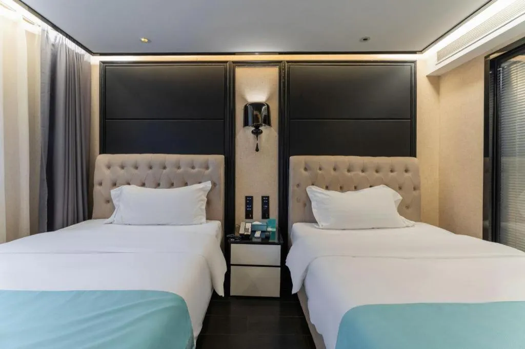 Bed in Xana Hotelle·Nanchang Bayi Square Metro Station