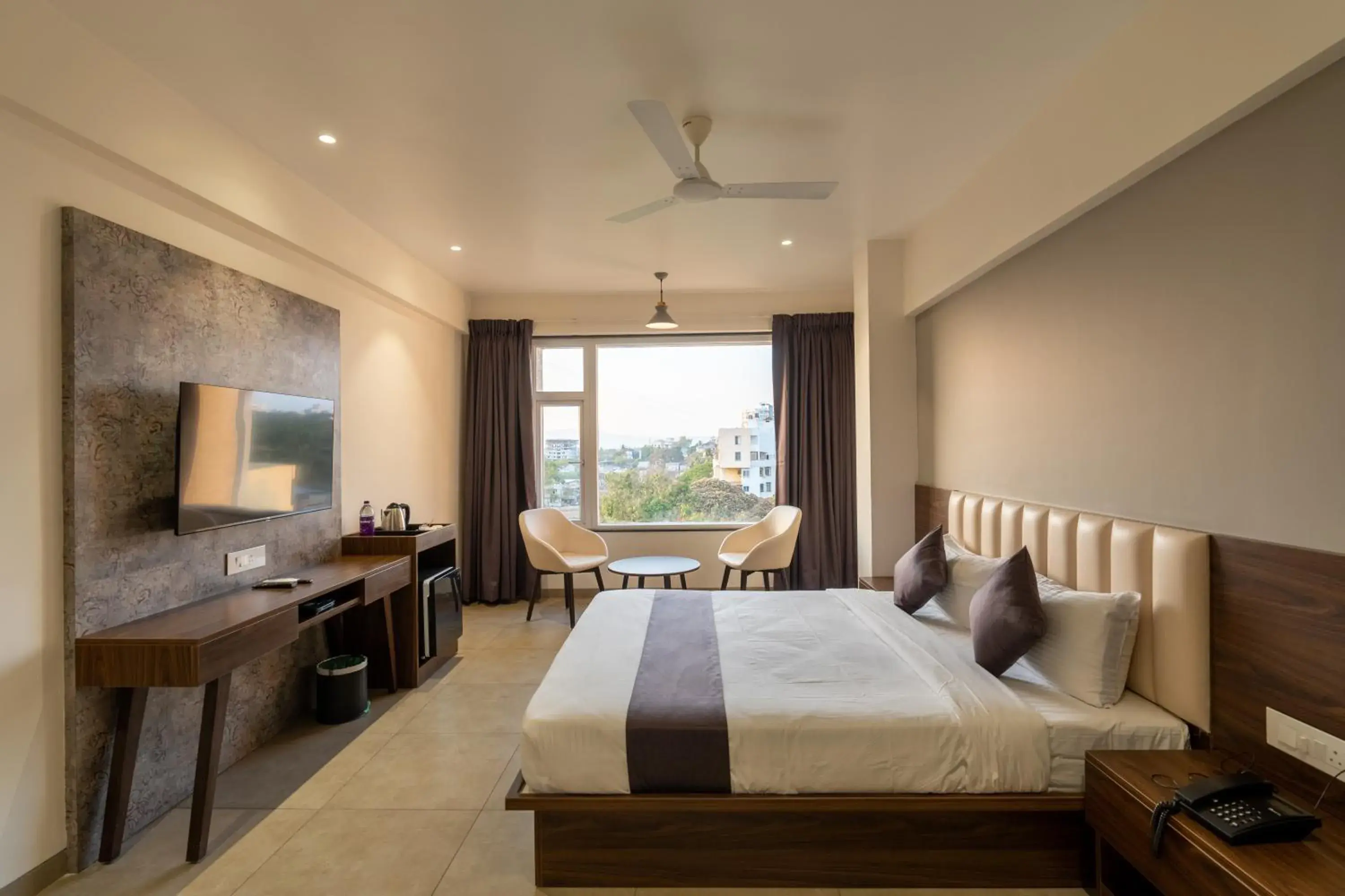 Photo of the whole room, Bed in The Living Hub Business Hotel, Kolhapur Photo of the whole room, Bed in The Living Hub Business Hotel, Kolhapur