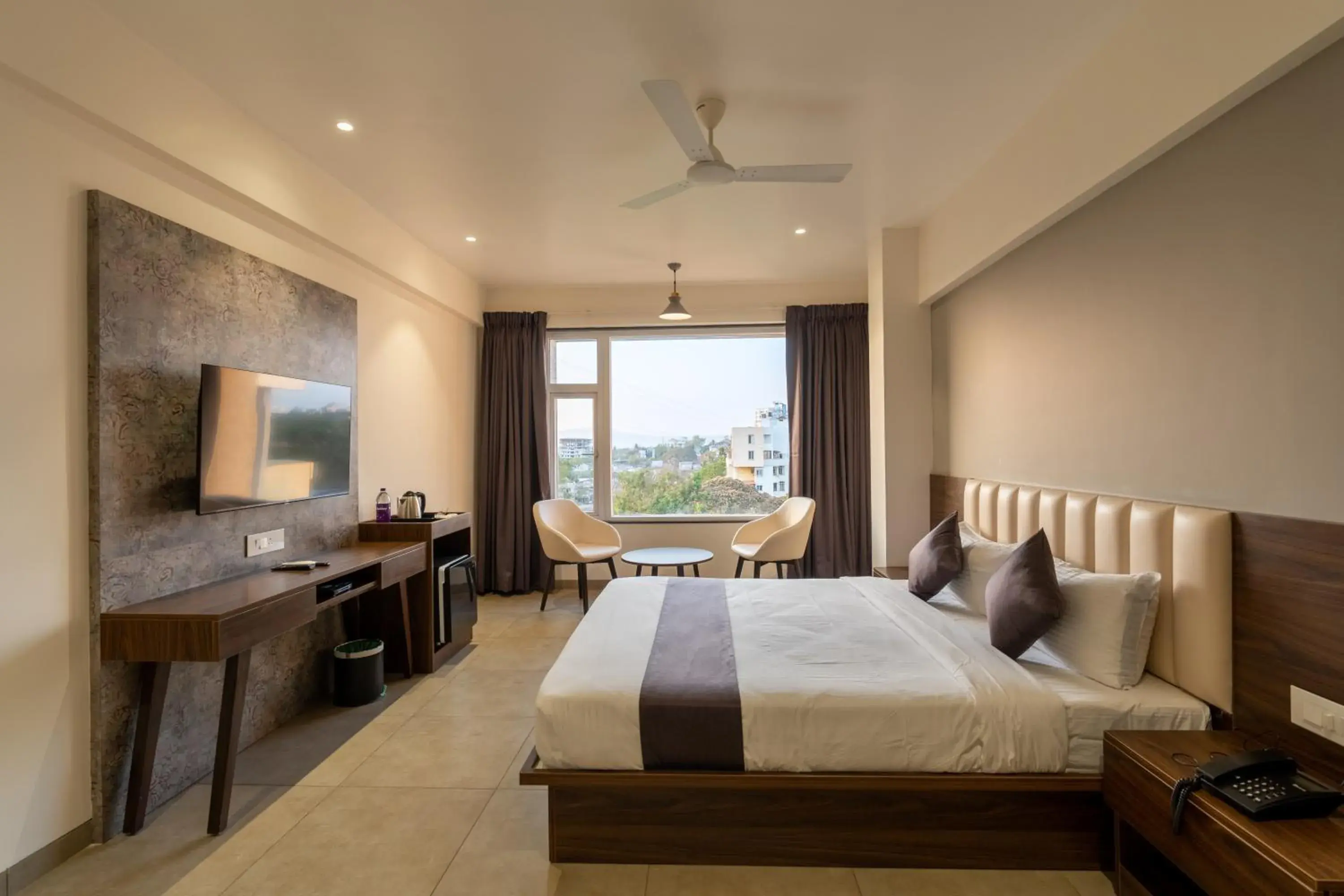 Photo of the whole room, Bed in The Living Hub Business Hotel, Kolhapur Photo of the whole room, Bed in The Living Hub Business Hotel, Kolhapur