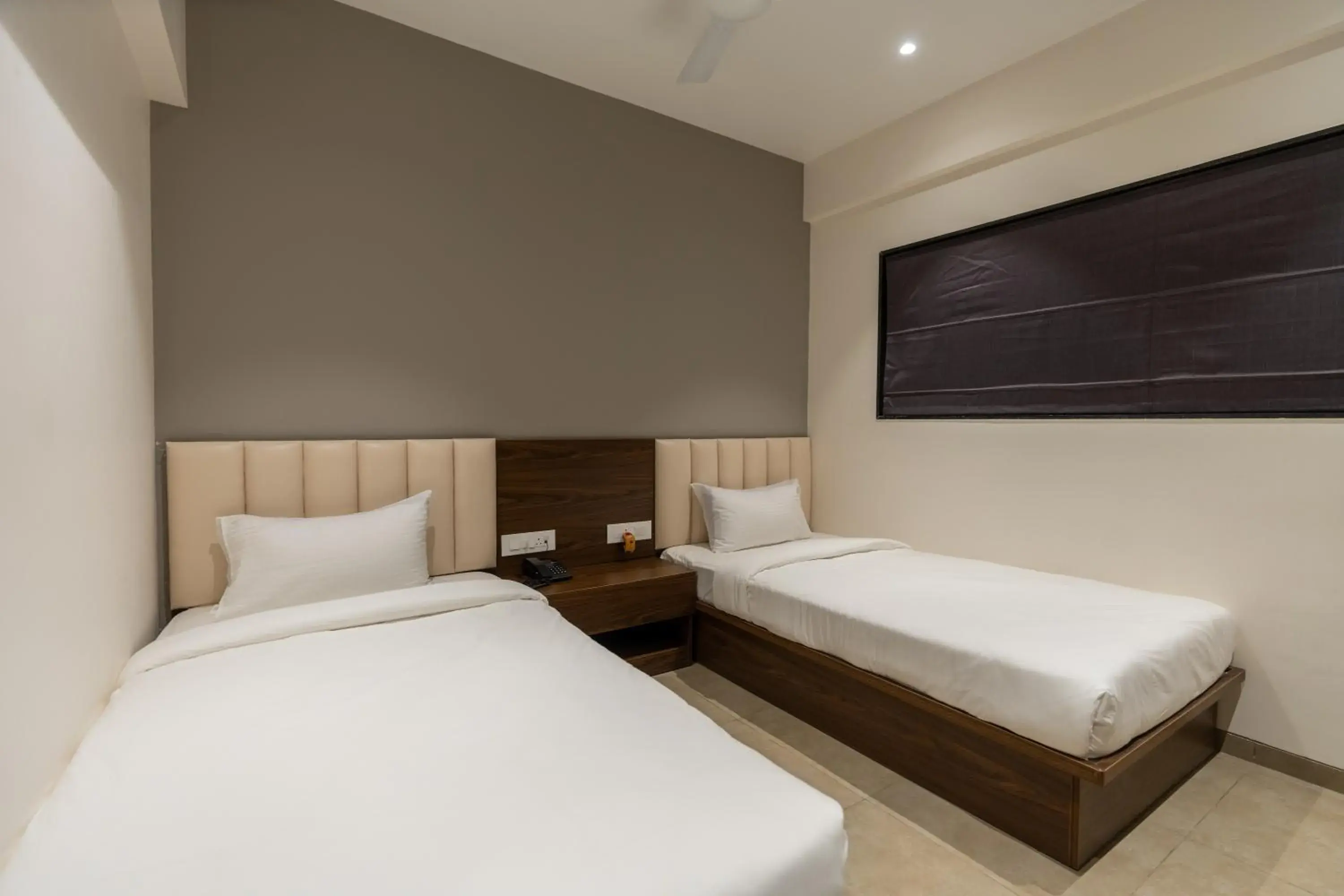 Bed in The Living Hub Business Hotel, Kolhapur Bed in The Living Hub Business Hotel, Kolhapur