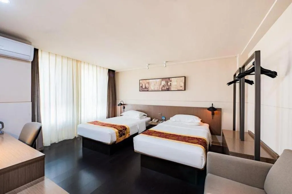 Bed in Jinjiang Inn Select Changchun Yuanda Street