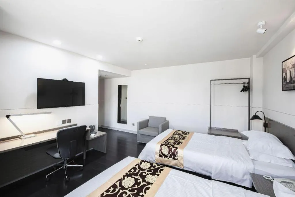 Bed in Jinjiang Inn Select Changchun Yuanda Street