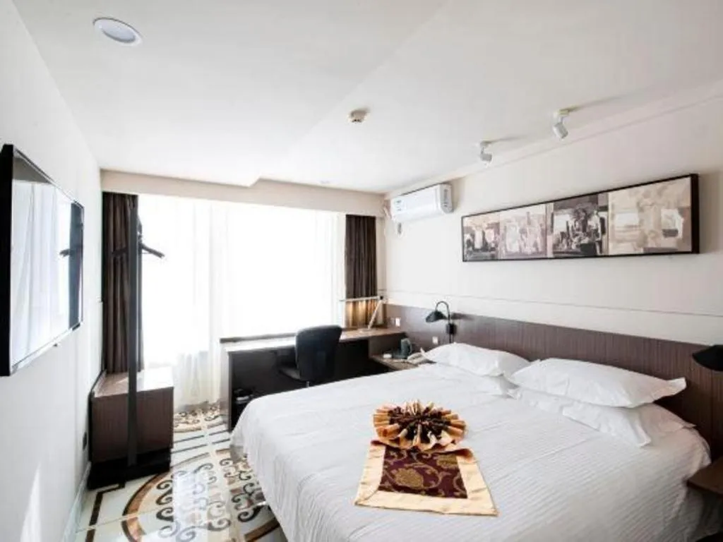 Bed in Jinjiang Inn Select Changchun Yuanda Street