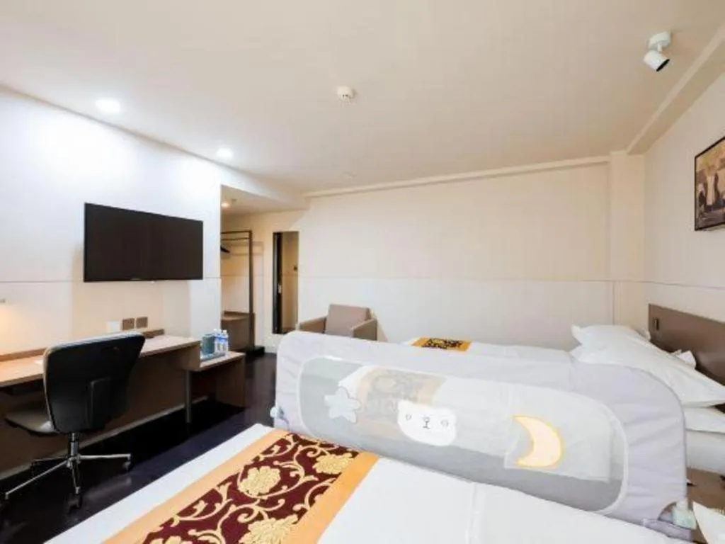 Bed in Jinjiang Inn Select Changchun Yuanda Street