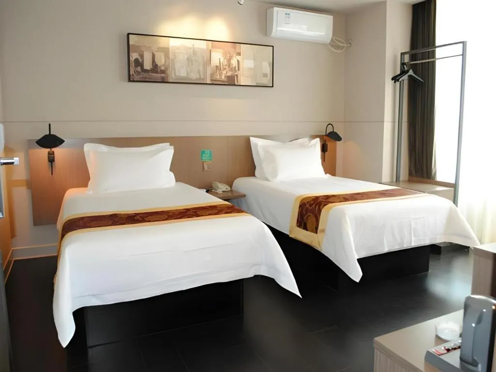 Bed in Jinjiang Inn Select Changchun Yuanda Street