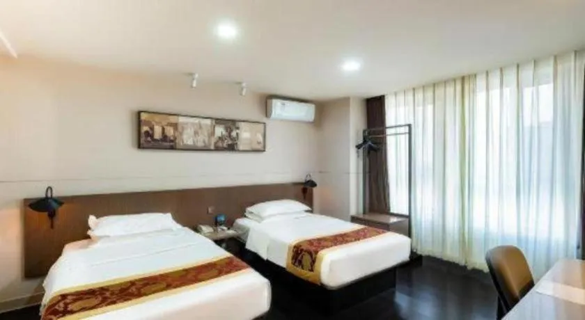 Bed in Jinjiang Inn Select Changchun Yuanda Street