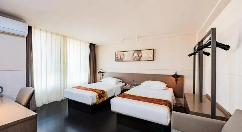 Bed in Jinjiang Inn Select Changchun Yuanda Street Bed in Jinjiang Inn Select Changchun Yuanda Street