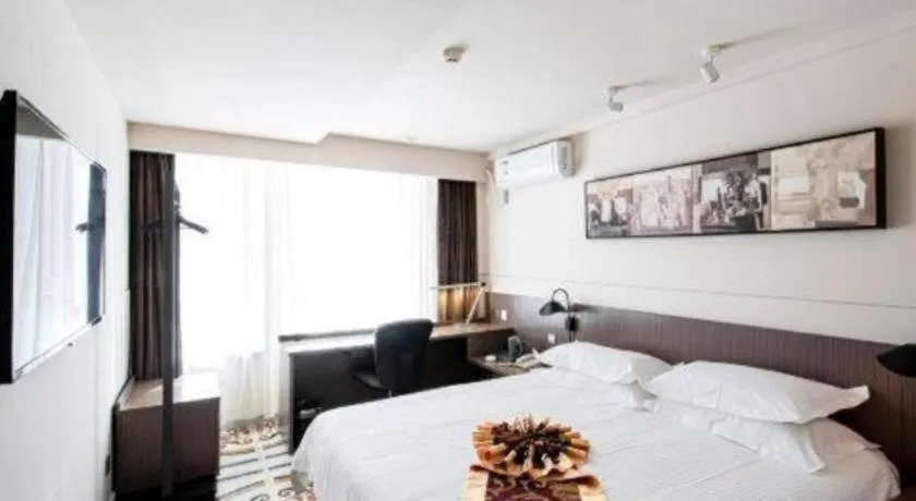 Bed in Jinjiang Inn Select Changchun Yuanda Street