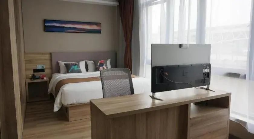 Bed in Pai Hotel Zhenjiang Railway Station South Square Bed in Pai Hotel Zhenjiang Railway Station South Square