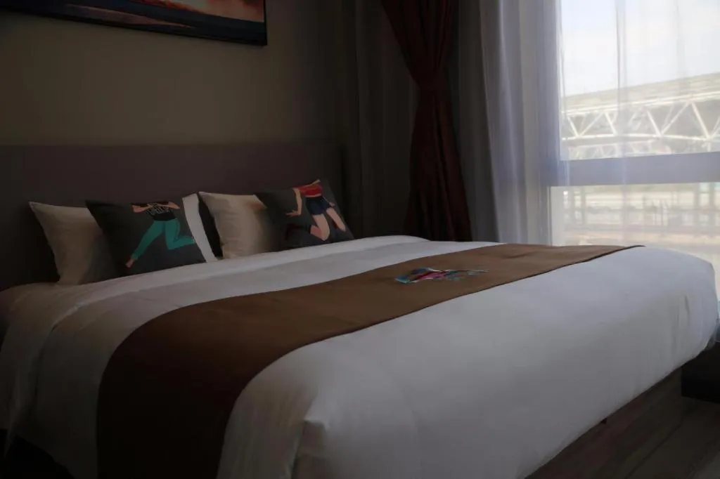 Bed in Pai Hotel Zhenjiang Railway Station South Square