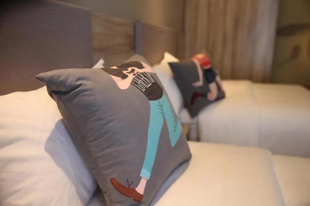 Bed in Pai Hotel Zhenjiang Railway Station South Square