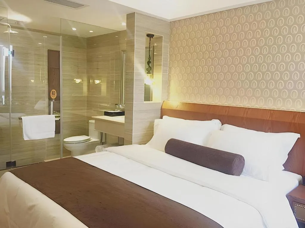 Bed in James Joyce Coffetel Chengdu Century City Convention and Exhibition Center