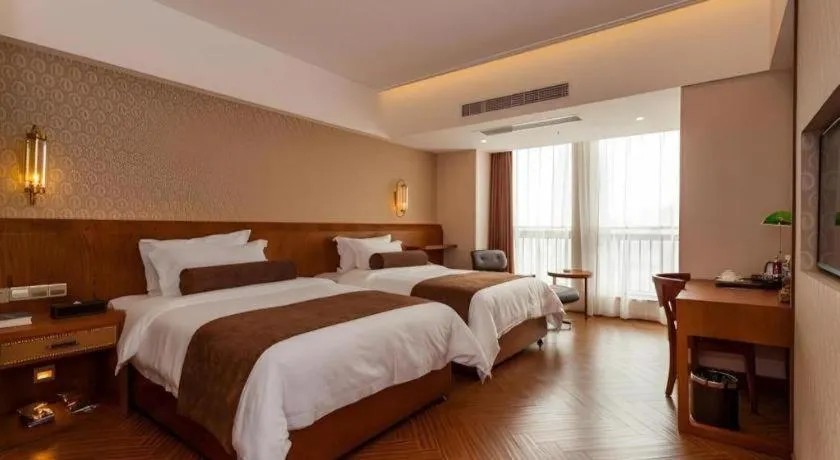 Bed in James Joyce Coffetel Chengdu Century City Convention and Exhibition Center