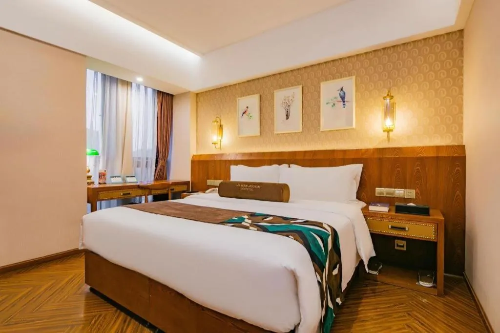 Bed in James Joyce Coffetel Chengdu Century City Convention and Exhibition Center