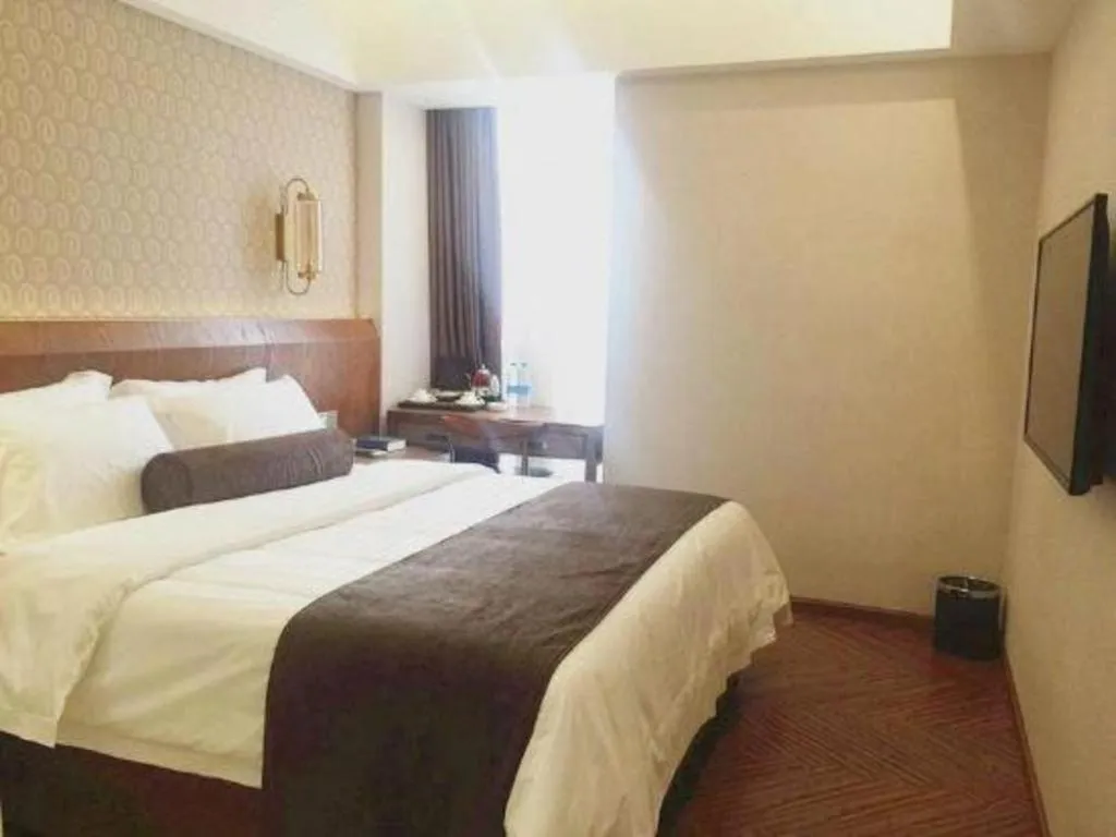 Bed in James Joyce Coffetel Chengdu Century City Convention and Exhibition Center