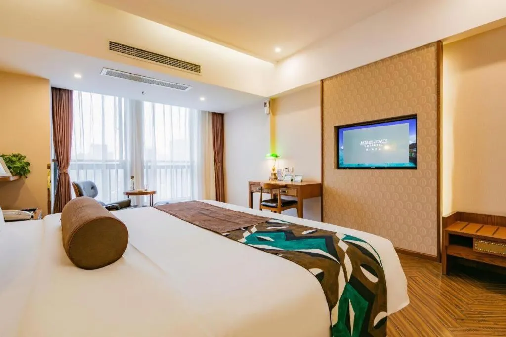 Bed in James Joyce Coffetel Chengdu Century City Convention and Exhibition Center