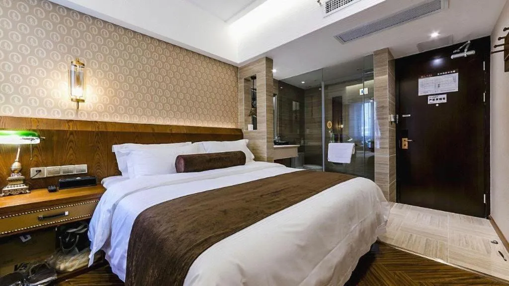 Bed in James Joyce Coffetel Chengdu Century City Convention and Exhibition Center