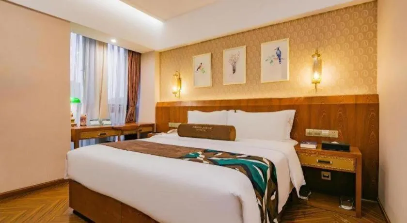 Bed in James Joyce Coffetel Chengdu Century City Convention and Exhibition Center