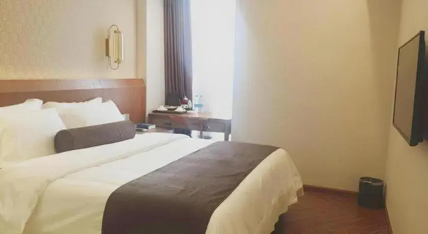 Bed in James Joyce Coffetel Chengdu Century City Convention and Exhibition Center Bed in James Joyce Coffetel Chengdu Century City Convention and Exhibition Center