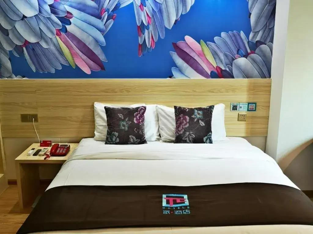 Bed in Hotel Pai Hezhou Lingfeng Plaza Bed in Hotel Pai Hezhou Lingfeng Plaza