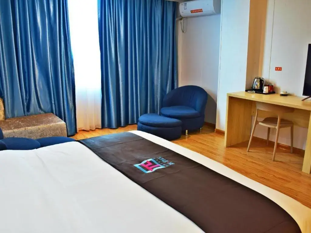 Bed in Hotel Pai Hezhou Lingfeng Plaza Bed in Hotel Pai Hezhou Lingfeng Plaza