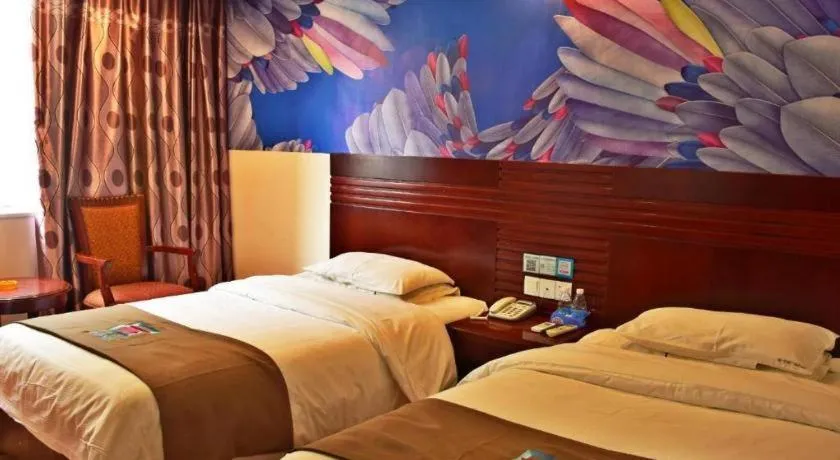 Bed in Hotel Pai Hezhou Lingfeng Plaza