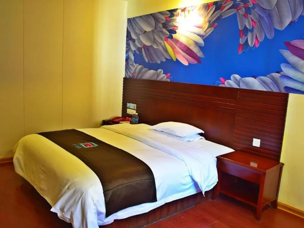 Bed in Hotel Pai Hezhou Lingfeng Plaza