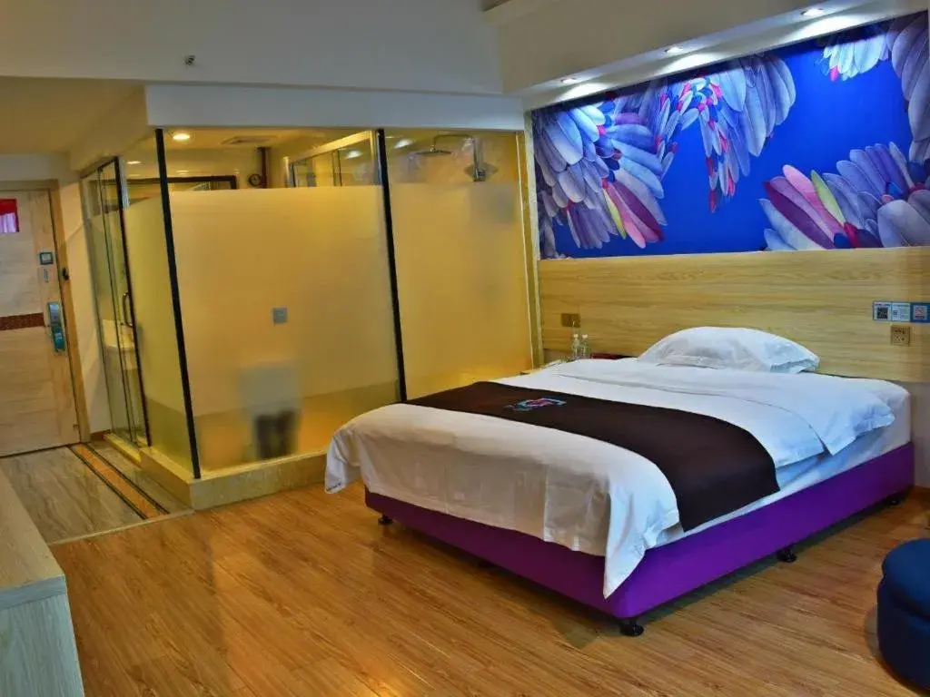 Bed in Hotel Pai Hezhou Lingfeng Plaza Bed in Hotel Pai Hezhou Lingfeng Plaza