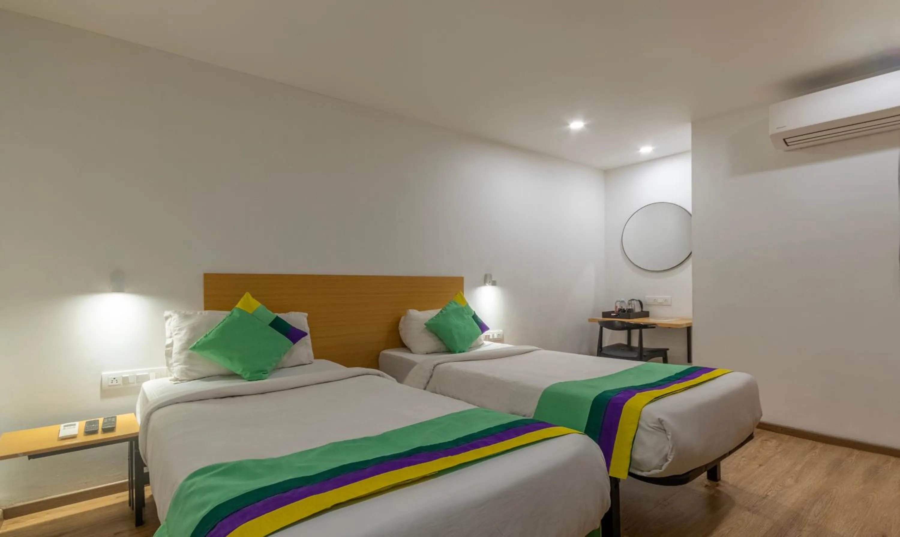 Bedroom, Bed in Treebo The Square