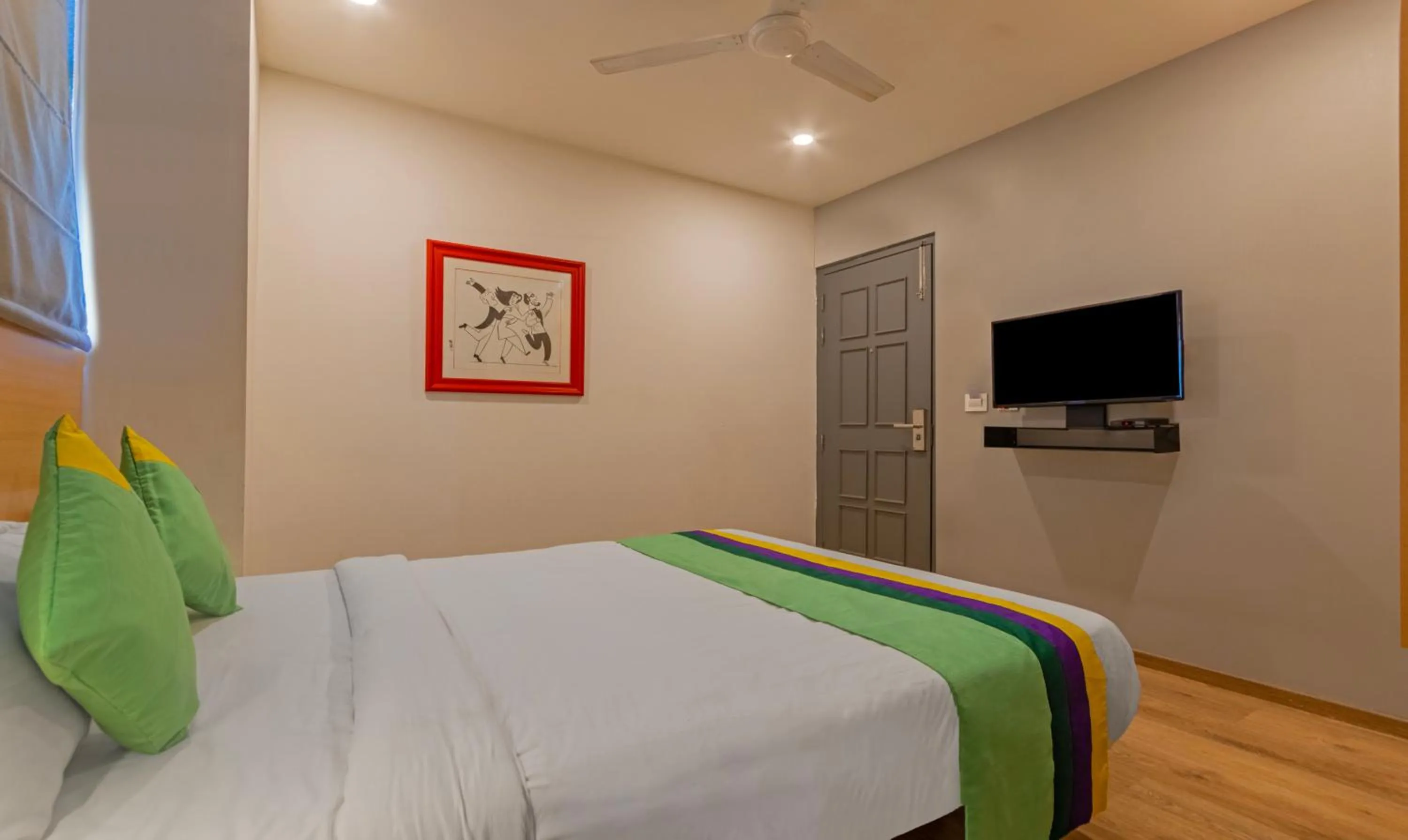 Bedroom, Bed in Treebo The Square