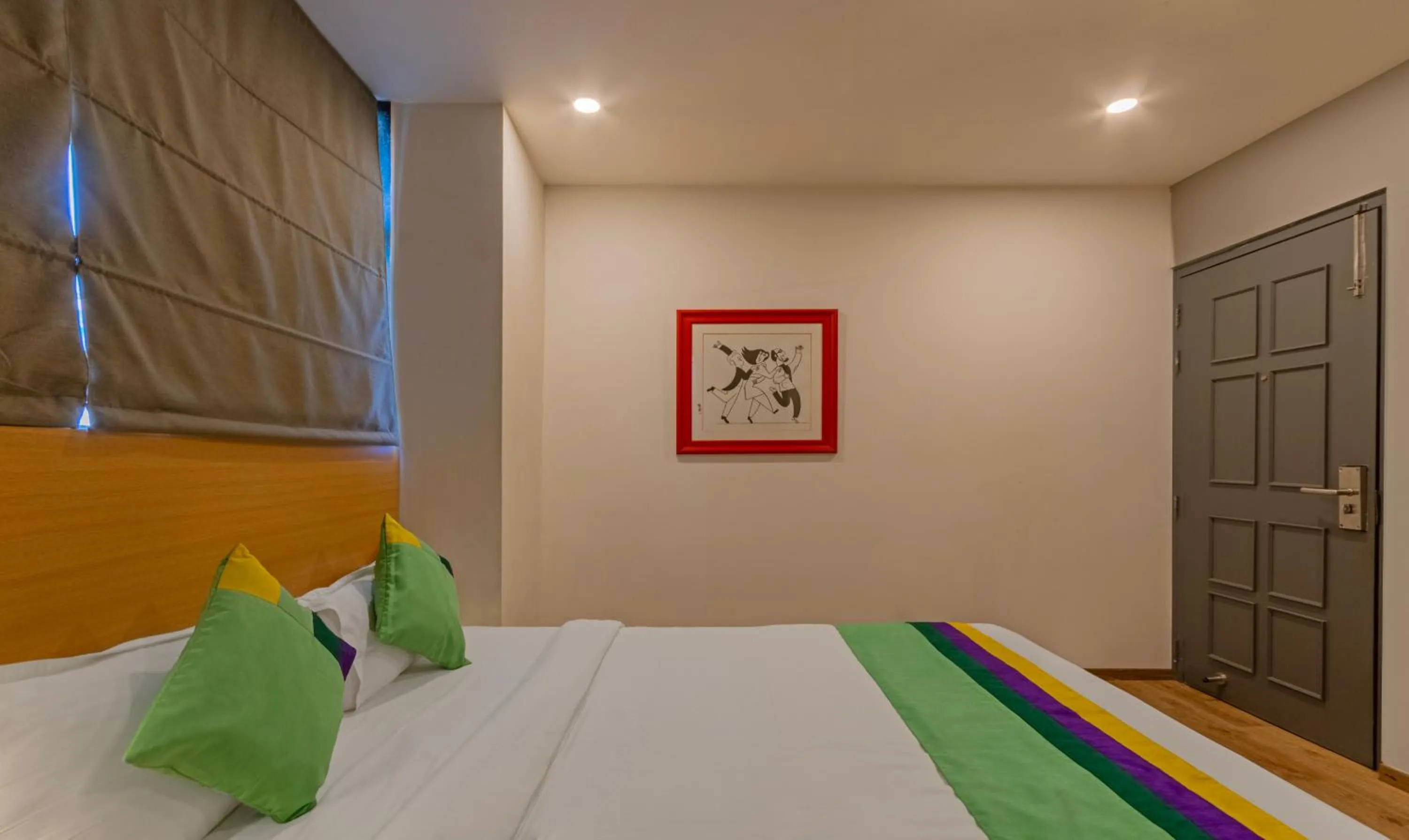 Bedroom, Bed in Treebo The Square