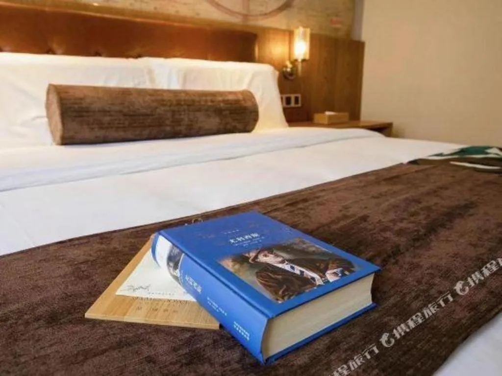 Bed in James Joyce Coffetel·Beijing Yizhuang Development Zone Dazu Square Tongji Road