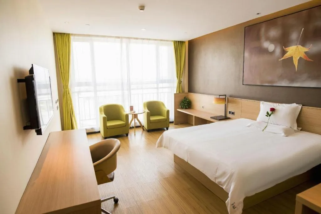 Bed in IU Hotel Zhangye High-Speed Railway Station