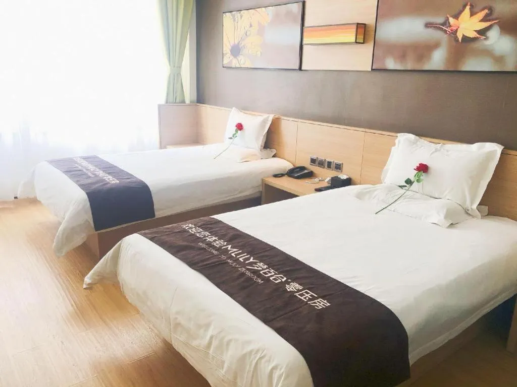 Bed in IU Hotel Zhangye High-Speed Railway Station
