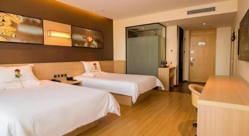 Bed in IU Hotel Zhangye High-Speed Railway Station