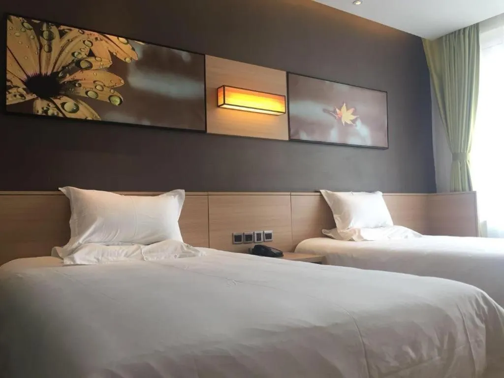 Bed in IU Hotel Zhangye High-Speed Railway Station