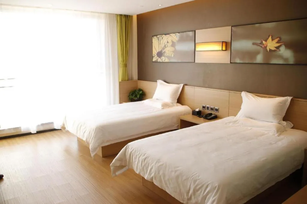 Bed in IU Hotel Zhangye High-Speed Railway Station