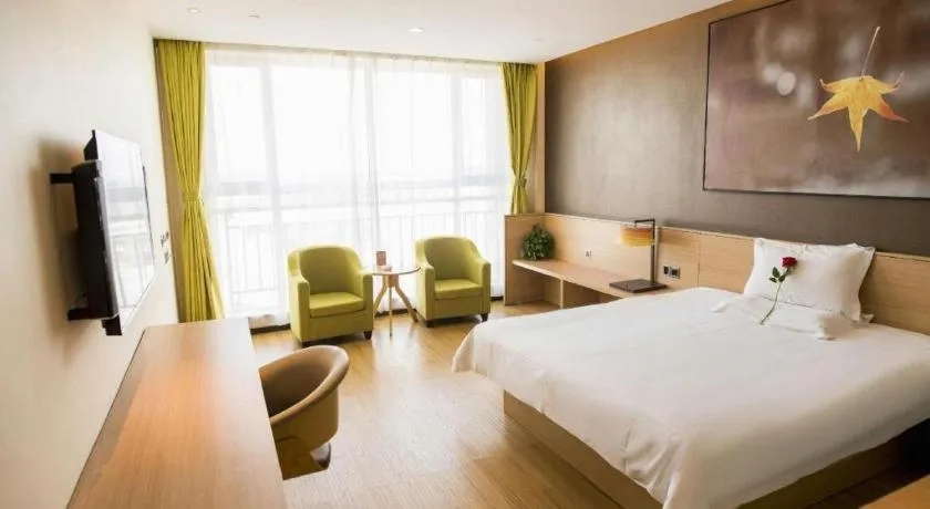 Bed in IU Hotel Zhangye High-Speed Railway Station