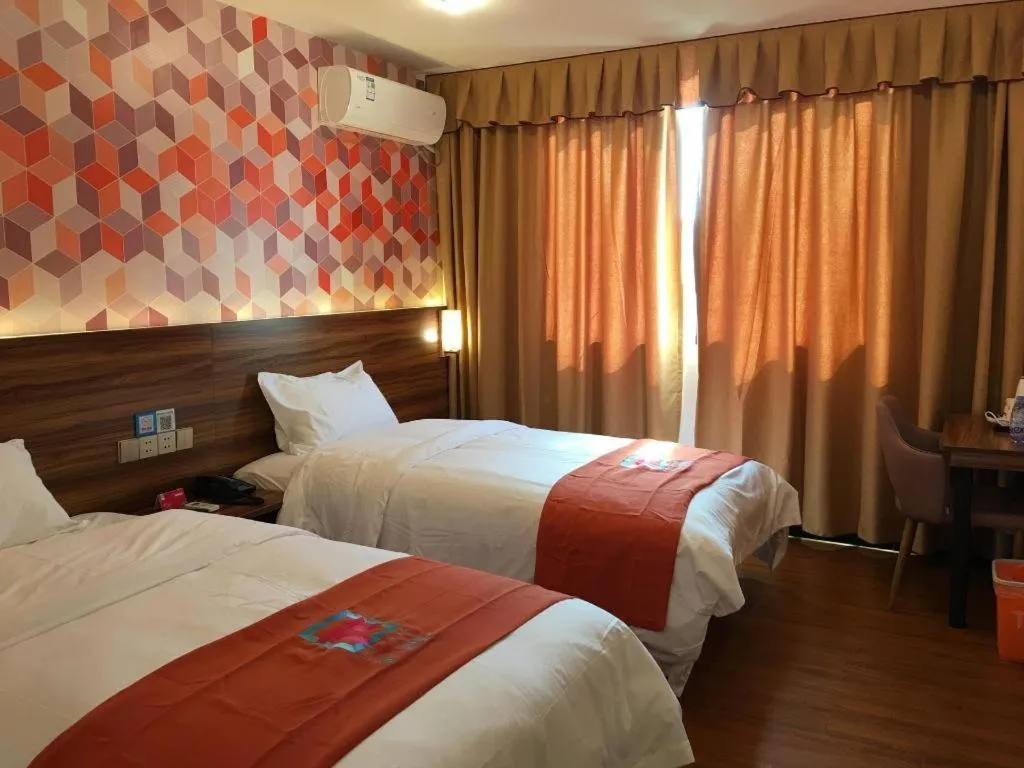 Bed in PAI Hotel Guangzhou Baiyun International Airport Zhongluotan Zhuliao Metro Station