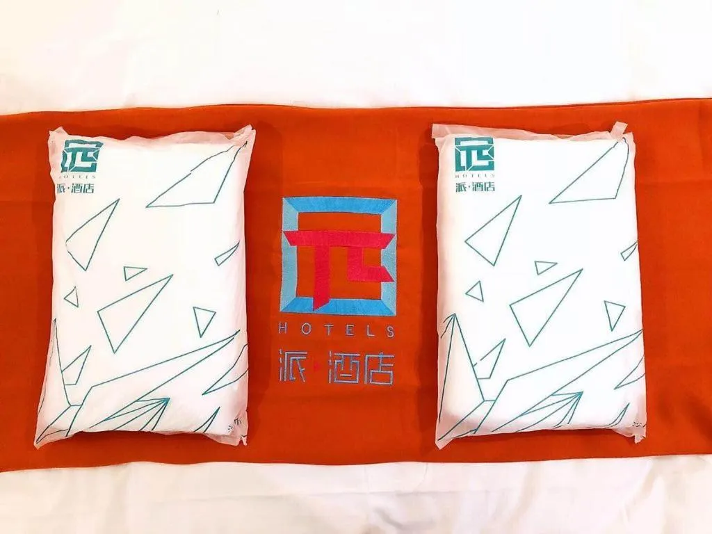 Bed in PAI Hotel Guangzhou Baiyun International Airport Zhongluotan Zhuliao Metro Station