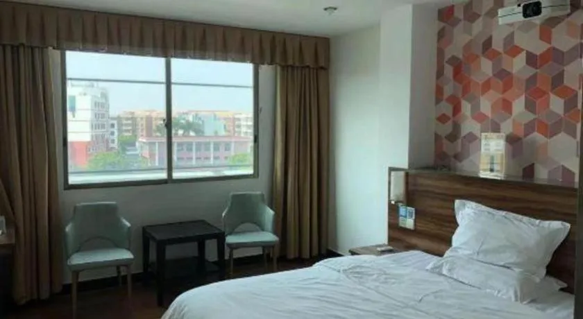 Bed in PAI Hotel Guangzhou Baiyun International Airport Zhongluotan Zhuliao Metro Station
