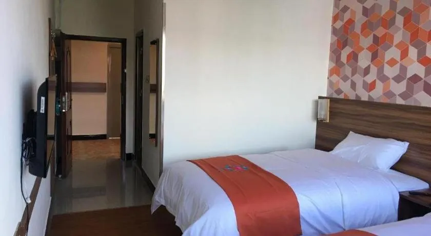 Bed in PAI Hotel Guangzhou Baiyun International Airport Zhongluotan Zhuliao Metro Station