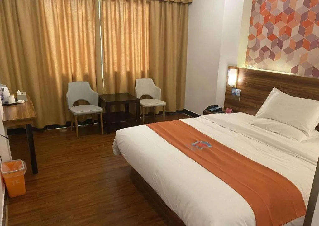 Bed in PAI Hotel Guangzhou Baiyun International Airport Zhongluotan Zhuliao Metro Station