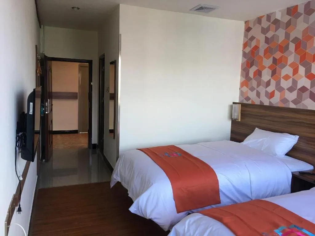 Bed in PAI Hotel Guangzhou Baiyun International Airport Zhongluotan Zhuliao Metro Station