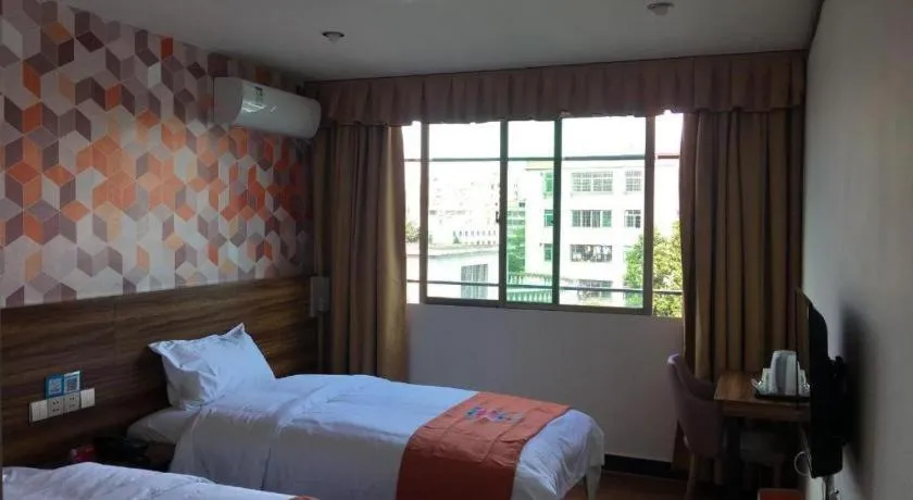 Bed in PAI Hotel Guangzhou Baiyun International Airport Zhongluotan Zhuliao Metro Station