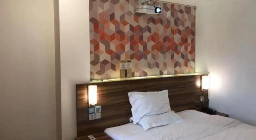 Bed in PAI Hotel Guangzhou Baiyun International Airport Zhongluotan Zhuliao Metro Station