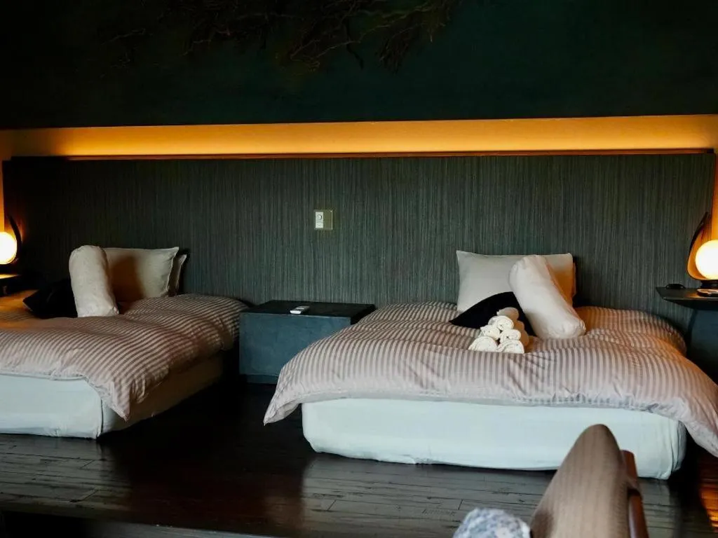 Bed in Yufuin Luxury Villa -zakuro-