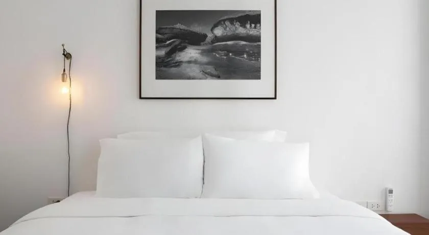 Bed in Rangsiya Boutique Hotel